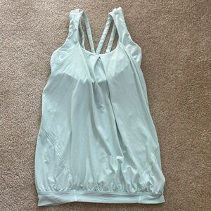 Lululemon Women's Light Green Top, built in bra, cute flowy design. Size S